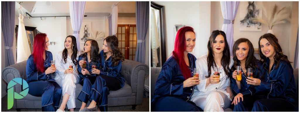 Bridesmaids share a glass of champagne int he bridal suite before their forest house lodge wedding.